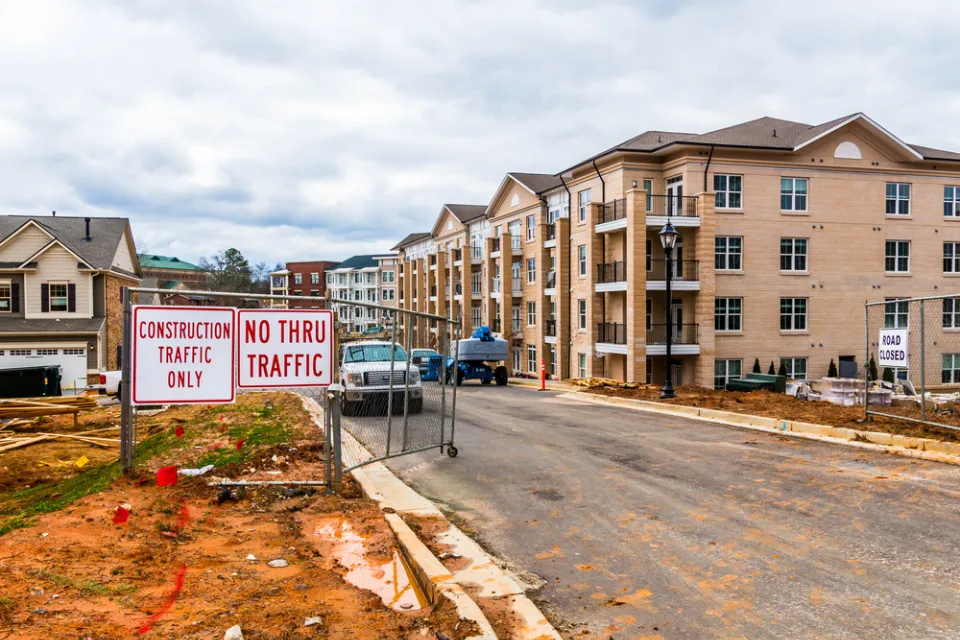 Construction site with 4-story apartment buildings in progress